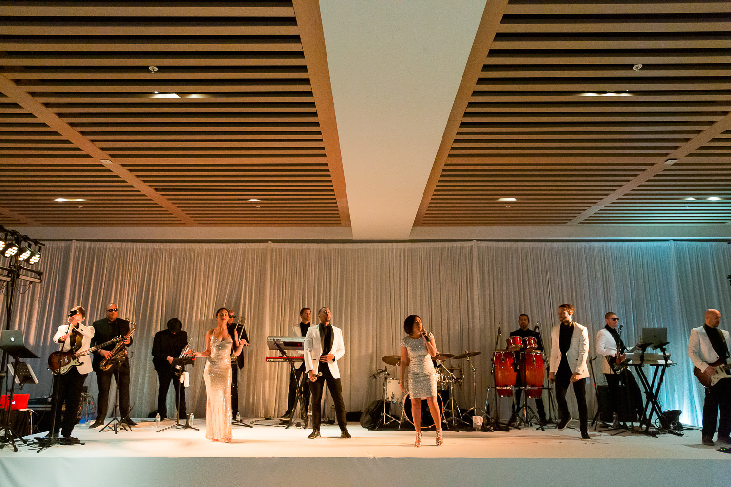 The band, Libido, performs on stage during at wedding at the Miami Beach Edition.