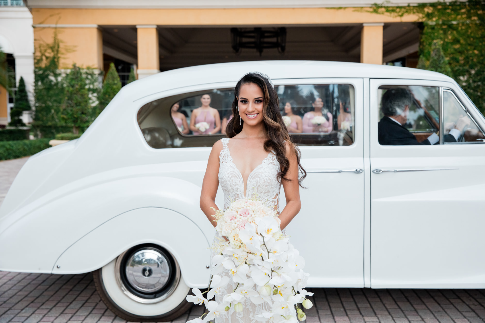 bridesmaids wait to see bride for the first time in her wedding dress at the Ritz-Carlton, Key Biscayne
