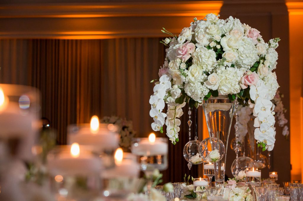 elegant florals adorn the wedding meal tables