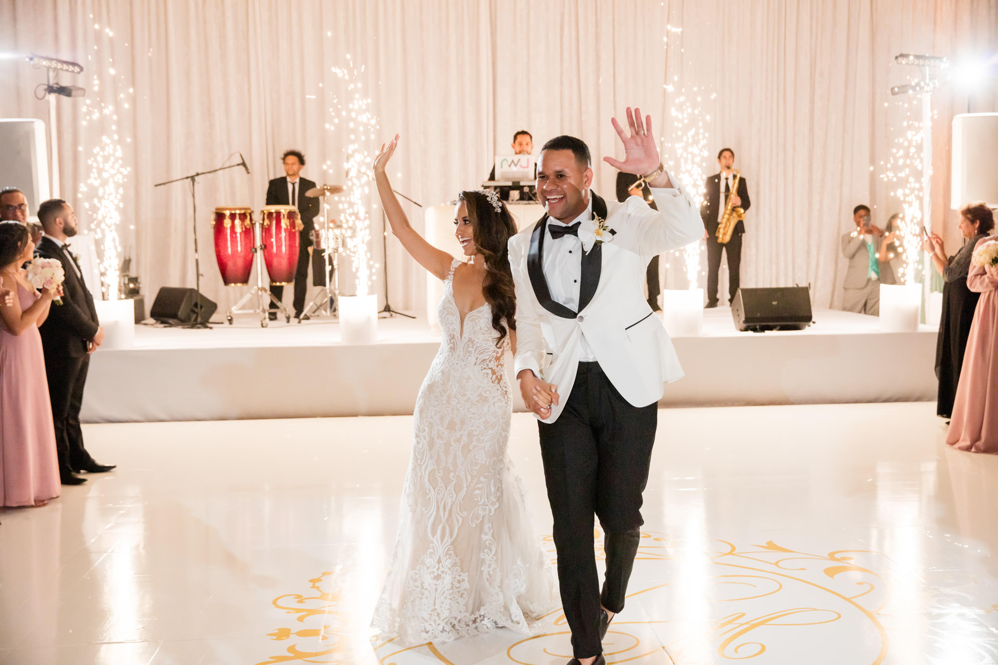 bride and groom with cold sparklers at the Ritz-Carlton Key Biscayne
