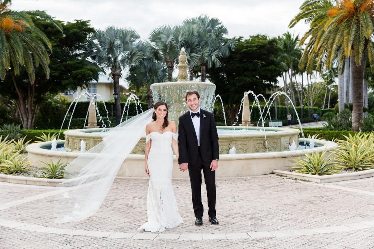 Bride and groom in front of the fountain at the Ritz Carlton in Key Biscayne.