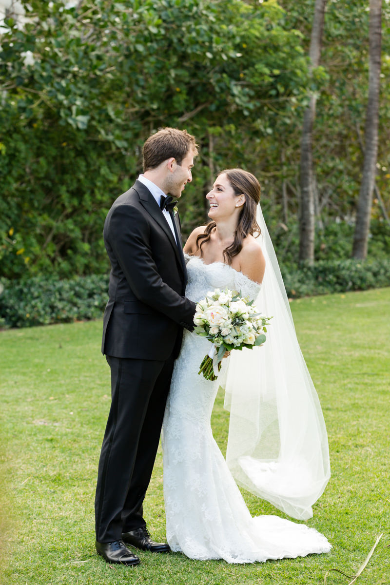 Bride and groom kissing at their wedding at the Ritz Carlton in Key Biscayne.