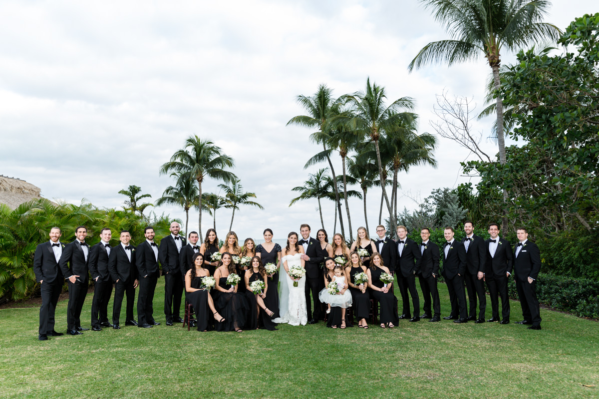 Large bridal party dressed in all black at the Ritz Carlton in Key Biscayne.
