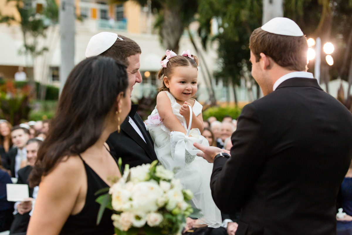 Flower girl passing out flowers at the Ritz Carlton in Key Biscayne.
