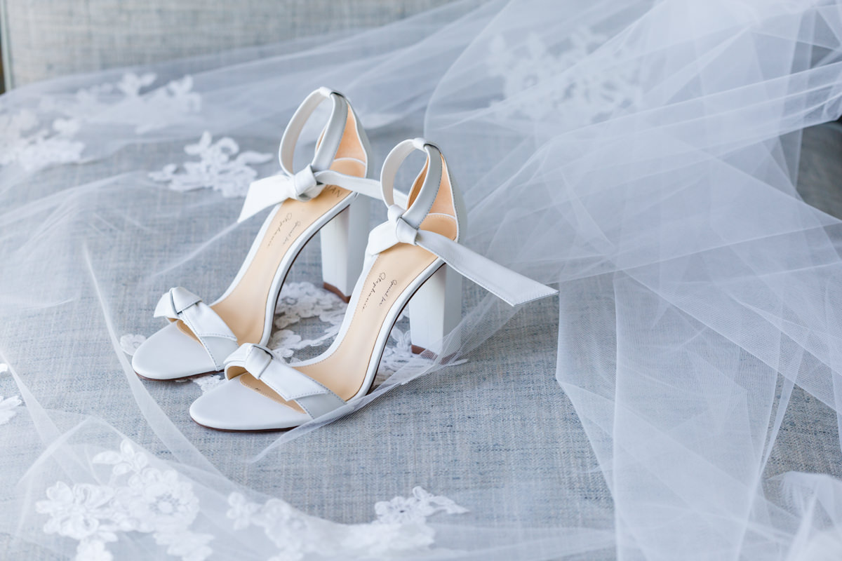 Detail of wedding shoes and veil during a wedding at the Ritz Carlton in Key Biscayne.