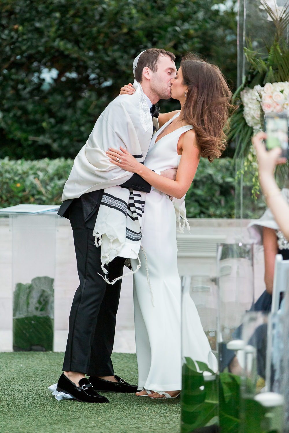 First kiss during a wedding ceremony at the Miami Beach Edition.