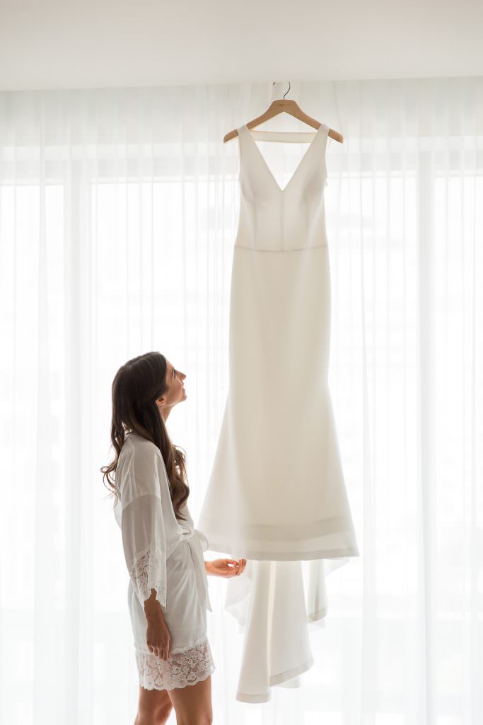 A bride looks at her Vera Wang Wedding gown at the Edition on Miami Beach.