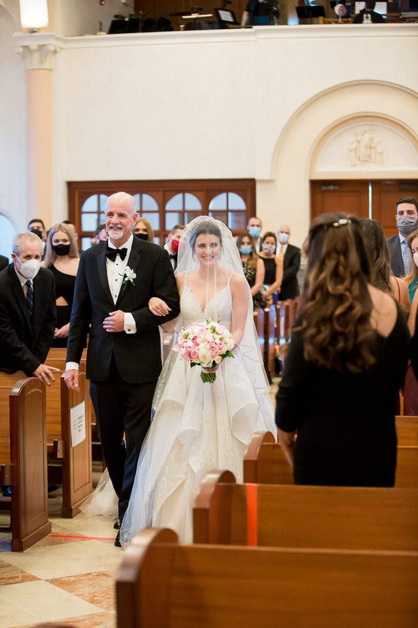 Vintage rolls royce in front of St. Patrick's church in Miami Beach.