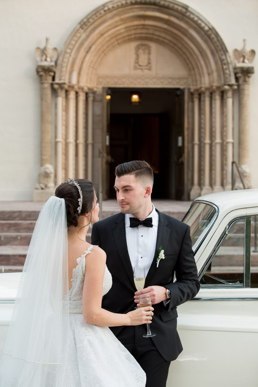 Wedding portraits in front of St Patrick's church in Miami Beach.