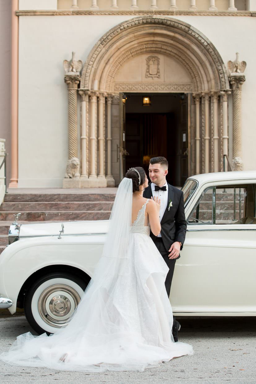 Wedding portraits in front of St Patrick's church in Miami Beach.