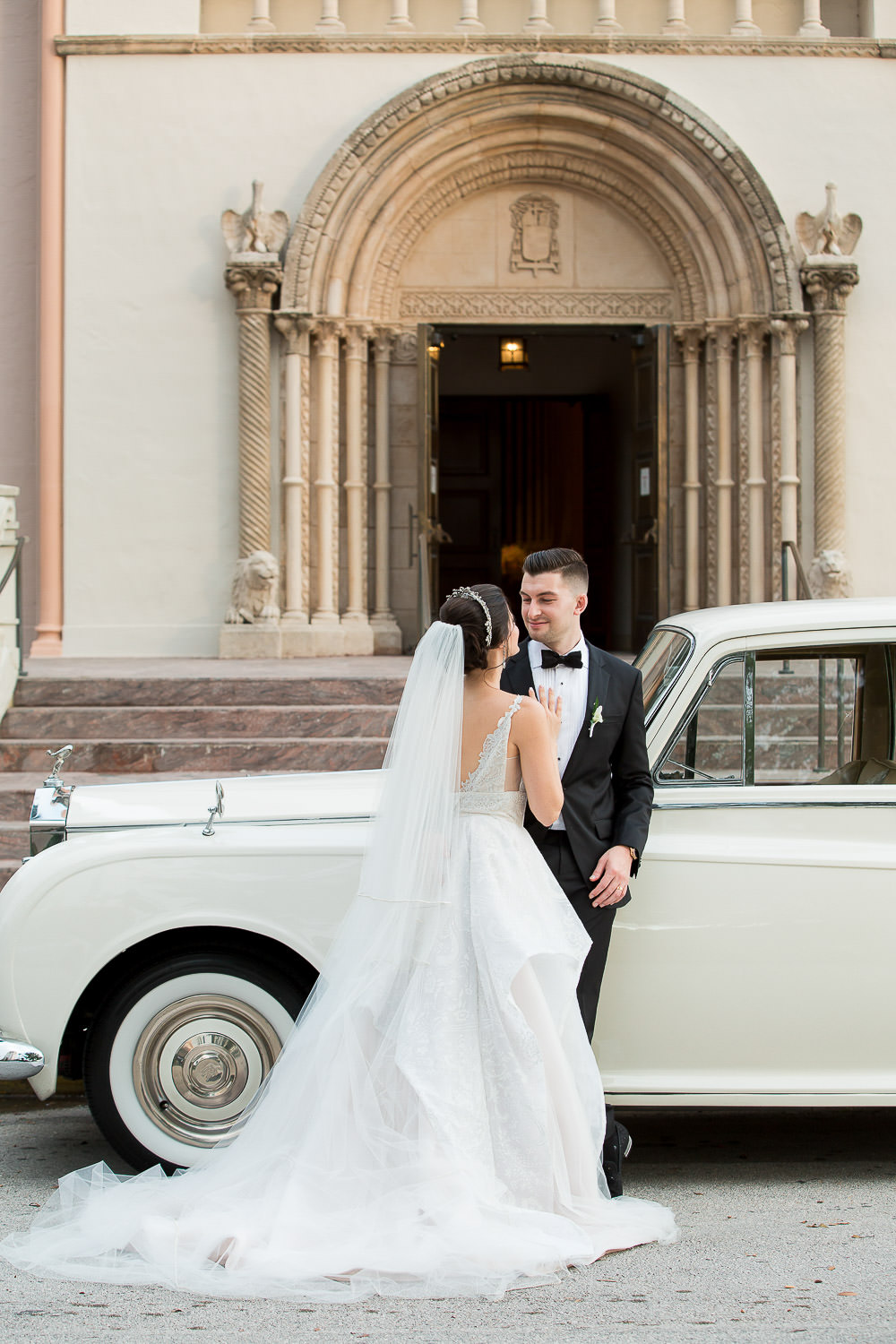 Wedding portraits in front of St Patrick's church in Miami Beach.
