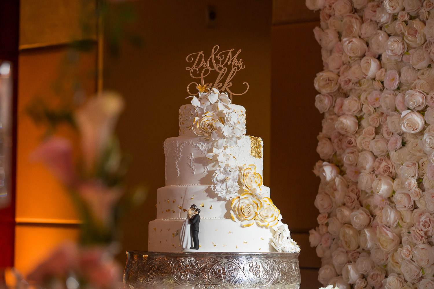 Monogramed cake top during a wedding at the Mandarin Oriental.