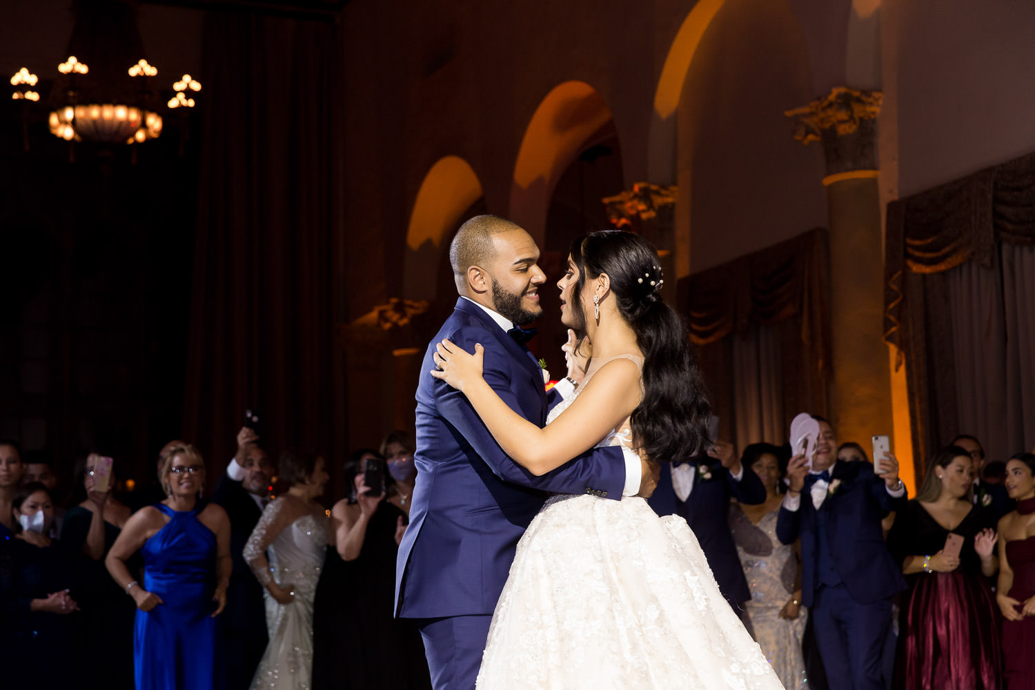 Bride and groom share a first dance in the country club ballroom at the Biltmore Hotel in Miami.