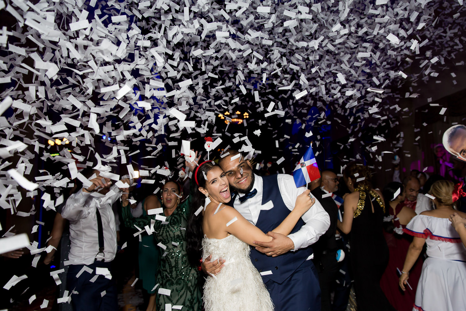 Hora loca and confetti at the wedding reception at the Biltmore Hotel in Miami.