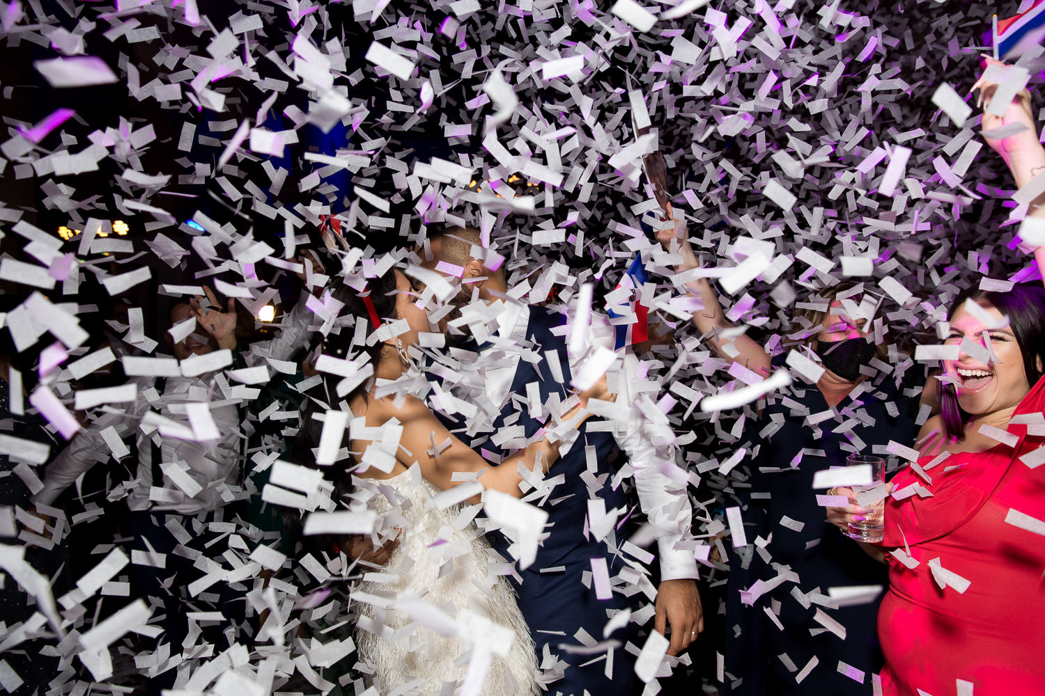 Hora loca and confetti at the wedding reception at the Biltmore Hotel in Miami.