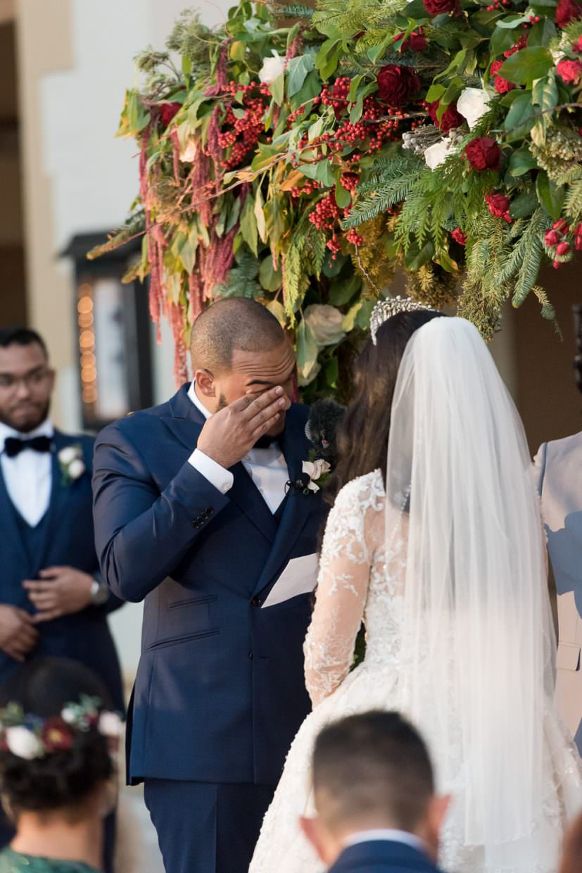 Groom crying during a wedding ceremony at the Biltmore Hotel.