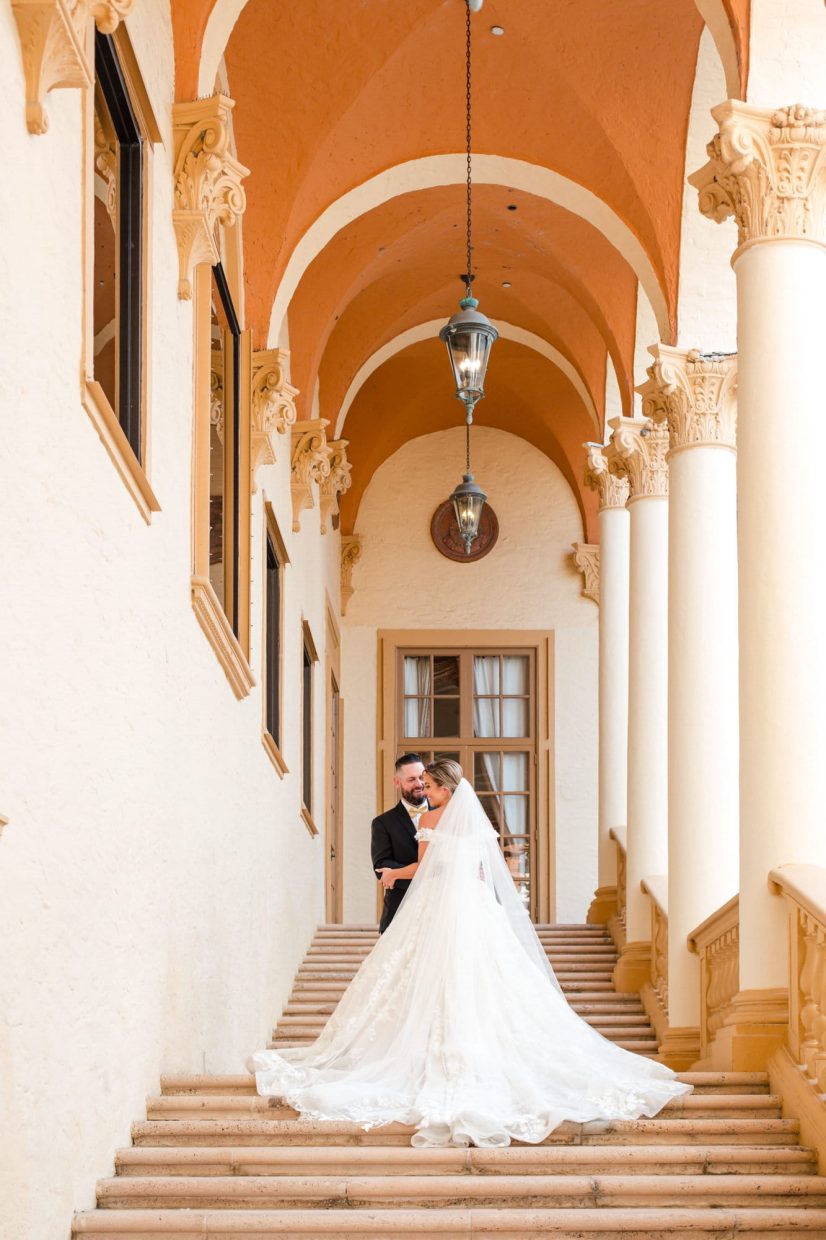 bride and groom pose for a wedding portrait at The Biltmore Miami