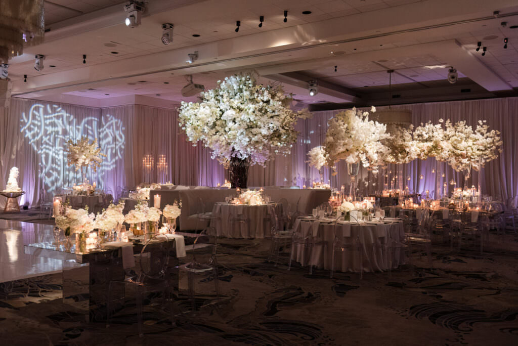 EWide shot of Polo Club reception space styled for elegant wedding dinner