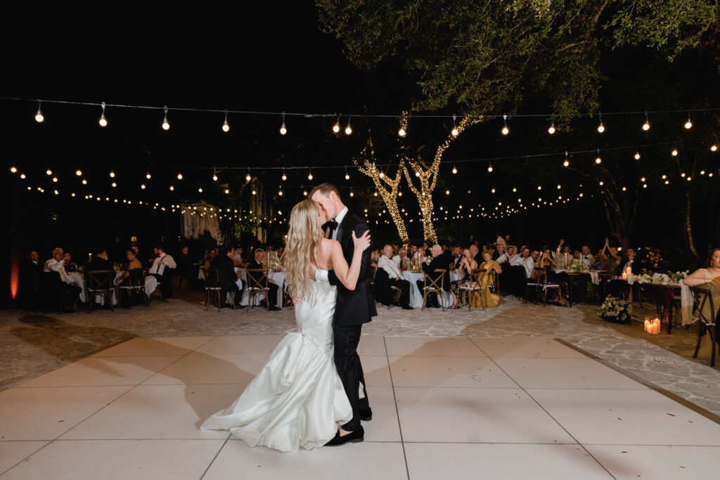 Bride and groom laughing together during their Deering Estate wedding