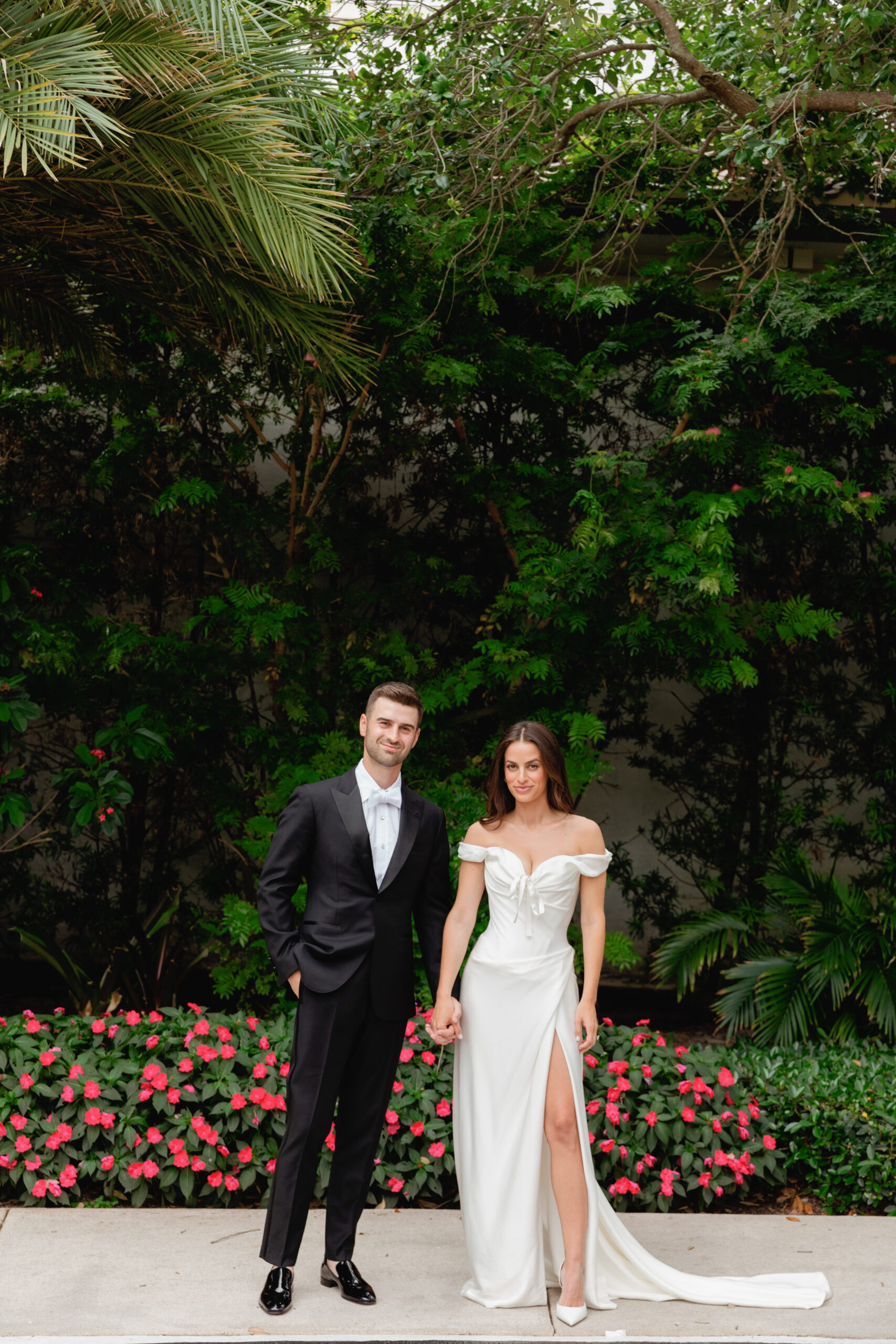 Bride and Groom Holding Hands Outside Addison Reserve Country Club