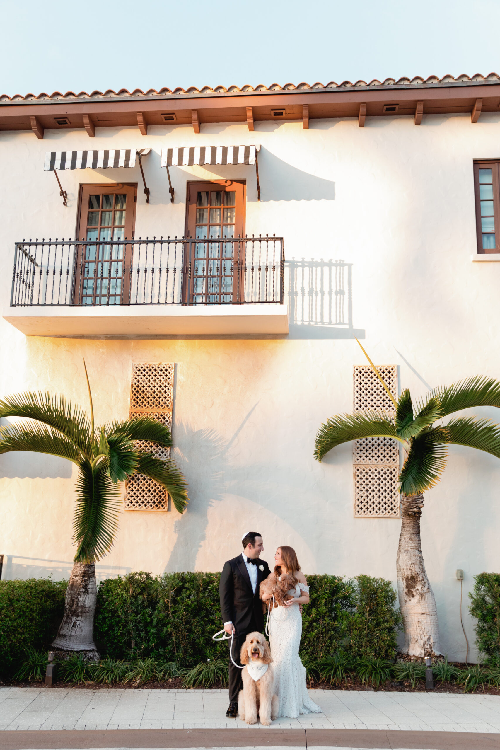 Bride and Groom with Dog Taking Photos at The Boca Raton Wedding