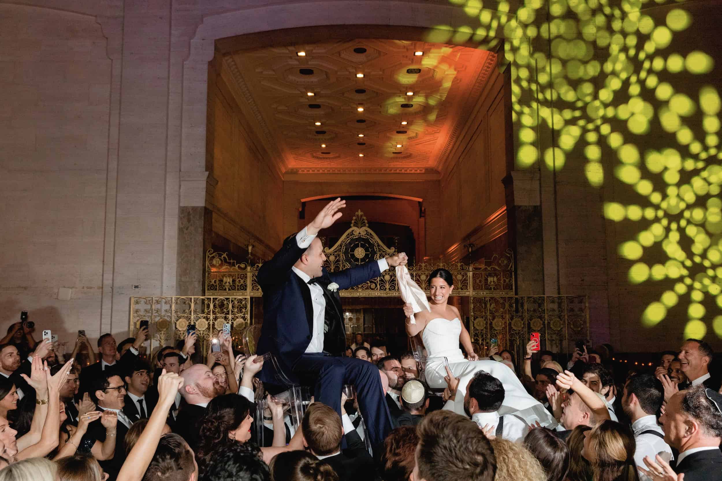 Bride and Groom Face Each Other During Jewish Wedding Hora