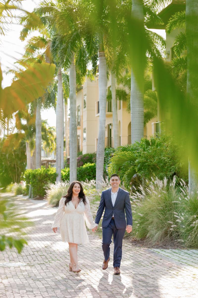 Palm Trees Peek Through Engagement Portraits Captured in Naples, FL